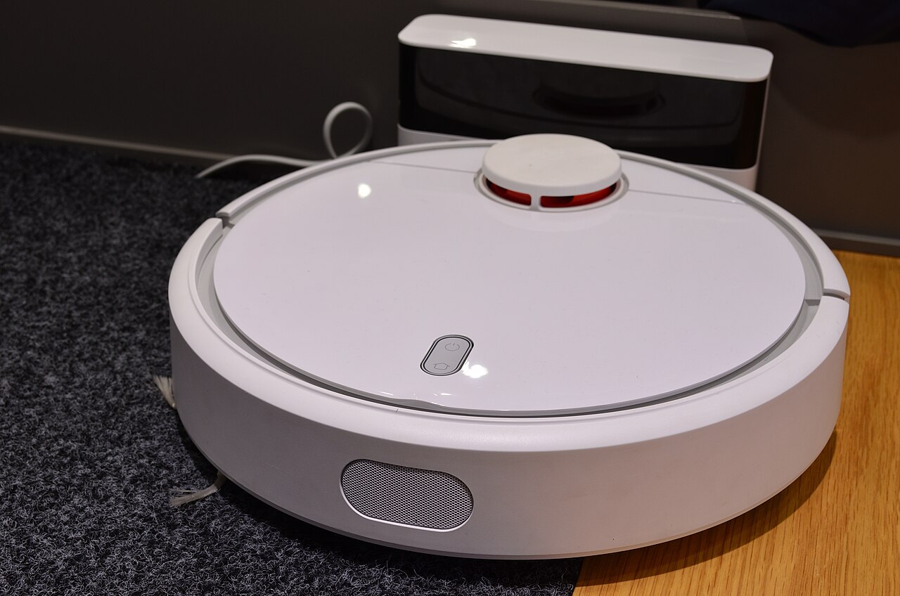 Real Xiaomi robot vacuum cleaner photographed at home